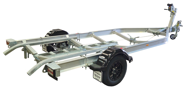 Galvanised tandem plant trailer with loading ramps parked outdoors for heavy equipment transport in Tasmania